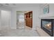 Main bedroom featuring a fireplace, closet, and bathroom at 11158 Antonine Wall Ct, Las Vegas, NV 89141