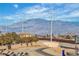 A beautiful mountain view with utility lines in the foreground at 11230 Hidden Peak Ave # 207, Las Vegas, NV 89135