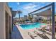 Serene community pool and lounge area offering a relaxing retreat for residents to unwind at 11230 Hidden Peak Ave # 207, Las Vegas, NV 89135