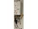 This is a Rinnai tankless water heater at 145 Medianoche St, Las Vegas, NV 89138