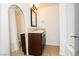 Classic bathroom featuring a vanity with granite countertop and a bathtub with a shower at 200 E Desert Rose Dr, Henderson, NV 89015