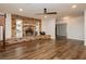 Bright living room with brick fireplace and hardwood floors at 200 E Desert Rose Dr, Henderson, NV 89015