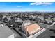 Black and white aerial view of a single-story home with a terra cotta roof and views of the Las Vegas skyline at 2045 Summit Pointe Dr, Las Vegas, NV 89117