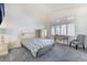 Well-lit bedroom with plantation shutters, neutral walls, and classic furnishings at 2045 Summit Pointe Dr, Las Vegas, NV 89117