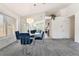 Stylish dining room featuring a modern chandelier and a mirrored accent wall for added light at 2045 Summit Pointe Dr, Las Vegas, NV 89117