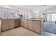 Bright kitchen with stainless steel appliances, granite countertops, and tile flooring at 2045 Summit Pointe Dr, Las Vegas, NV 89117