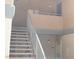 Stairway leads to the entrances of units in a multi-Gathering residential building at 221 Mission Newport Ln # 208, Las Vegas, NV 89107