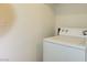 Convenient laundry area with washing machine for in-unit laundry at 221 Mission Newport Ln # 208, Las Vegas, NV 89107