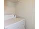 Laundry area with white dryer at 221 Mission Newport Ln # 208, Las Vegas, NV 89107