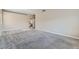 Large bedroom showcasing plush carpeting, neutral paint, and an adjacent bathroom at 23 Antero Dr, Henderson, NV 89074