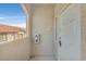 The entryway includes a white door, unit number, and fire extinguisher box at 2305 W Horizon Ridge Pkwy # 3324, Henderson, NV 89052