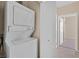 A laundry closet with a stacked washer and dryer at 2305 W Horizon Ridge Pkwy # 3324, Henderson, NV 89052