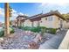 Clubhouse exterior with landscaped rock garden and convenient guest parking at 231 W Horizon Ridge Pkwy # 2413, Henderson, NV 89012