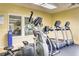 Well-equipped fitness center featuring cardio machines and ample natural light at 231 W Horizon Ridge Pkwy # 2413, Henderson, NV 89012