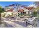 Outdoor lounge area with seating and sun shade perfect for relaxing in this community at 231 W Horizon Ridge Pkwy # 2413, Henderson, NV 89012