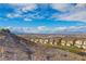 Scenic neighborhood view overlooking mountains and the Las Vegas skyline under a bright, cloudy sky at 231 W Horizon Ridge Pkwy # 2413, Henderson, NV 89012