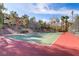 Enjoy a match on this community tennis court surrounded by mature trees at 231 W Horizon Ridge Pkwy # 2413, Henderson, NV 89012