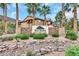 Community entrance featuring attractive landscaping and a decorative stone sign at 231 W Horizon Ridge Pkwy # 527, Henderson, NV 89012