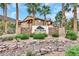 A manicured entrance to the community features lush greenery and a prominent sign at 231 W Horizon Ridge Pkwy # 527, Henderson, NV 89012
