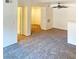 This open-concept living area is carpeted and leads to other rooms, making it perfect for modern living at 231 W Horizon Ridge Pkwy # 527, Henderson, NV 89012