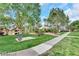 Scenic park area with lush greenery, walking path and covered seating at 231 W Horizon Ridge Pkwy # 527, Henderson, NV 89012