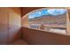This view from the balcony highlights mountain views and the covered parking areas at 231 W Horizon Ridge Pkwy # 527, Henderson, NV 89012