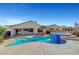 Backyard pool and spa with mountain views, desert landscaping for outdoor living at 2520 Eclipsing Stars Dr, Henderson, NV 89044