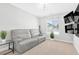 Bonus room with an entertainment center and comfortable seating area at 2536 Catallo St, Henderson, NV 89044