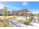 Inviting community space with shaded pergola, seating, and landscaped walkway, perfect for outdoor relaxation at 2536 Catallo St, Henderson, NV 89044