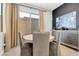 Cozy dining area with stylish decor, a modern table, and plenty of natural light at 2536 Catallo St, Henderson, NV 89044