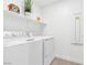 Bright laundry room featuring a modern washer and dryer at 2536 Catallo St, Henderson, NV 89044