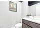 Chic powder room with modern fixtures, stylish decor, and a clean aesthetic at 2536 Catallo St, Henderson, NV 89044