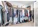 Spacious walk-in closet filled with organized clothing and shoe storage at 2536 Catallo St, Henderson, NV 89044