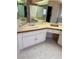 Well-lit bathroom featuring double sinks and vanity, offering a functional and stylish space at 2711 Seabridge Dr, Las Vegas, NV 89121