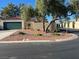 Charming single-story home featuring a two-car garage and desert landscaping at 2711 Seabridge Dr, Las Vegas, NV 89121