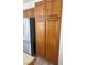 Kitchen view of stainless-steel refrigerator with wood cabinets at 2711 Seabridge Dr, Las Vegas, NV 89121