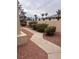 Stone walkway landscaped with shrubbery leading to the house at 2711 Seabridge Dr, Las Vegas, NV 89121