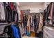 Spacious walk-in closet with ample storage and organization and custom shelving at 3066 Casarano Ct, Henderson, NV 89044