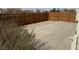 Spacious backyard concrete paver patio with privacy fence at 325 Ron Ave, Logandale, NV 89021