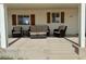 Cozy covered patio with wicker seating at 325 Ron Ave, Logandale, NV 89021