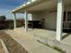 Covered patio with bar-height table and chairs at 325 Ron Ave, Logandale, NV 89021