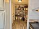 A well-stocked pantry with ample shelving space in an organized manner at 325 Ron Ave, Logandale, NV 89021