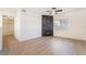 Bright living room featuring wood-look floors, modern fireplace, and a ceiling fan at 3400 Cabana Dr # 1084, Las Vegas, NV 89122