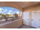 Covered patio featuring storage units with a view of the landscaped exterior at 3400 Cabana Dr # 1084, Las Vegas, NV 89122