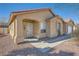 Charming single-story home featuring a stucco exterior, red tile roof, and a welcoming front porch at 3531 Barrel Bronco Ct, North Las Vegas, NV 89032