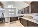 Well-equipped kitchen featuring stainless steel appliances and ample countertop space at 3531 Barrel Bronco Ct, North Las Vegas, NV 89032