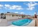 Backyard view of pool, patio, and home with a white exterior at 3800 San Joaquin Ave, Las Vegas, NV 89102