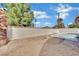 Landscaped backyard with pool, fire pit, and mature trees at 3800 San Joaquin Ave, Las Vegas, NV 89102