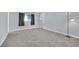 An empty bedroom with neutral walls and floors, with natural light at 3800 San Joaquin Ave, Las Vegas, NV 89102