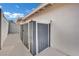 Outdoor view of a metal storage unit alongside the building wall in the backyard at 3800 San Joaquin Ave, Las Vegas, NV 89102